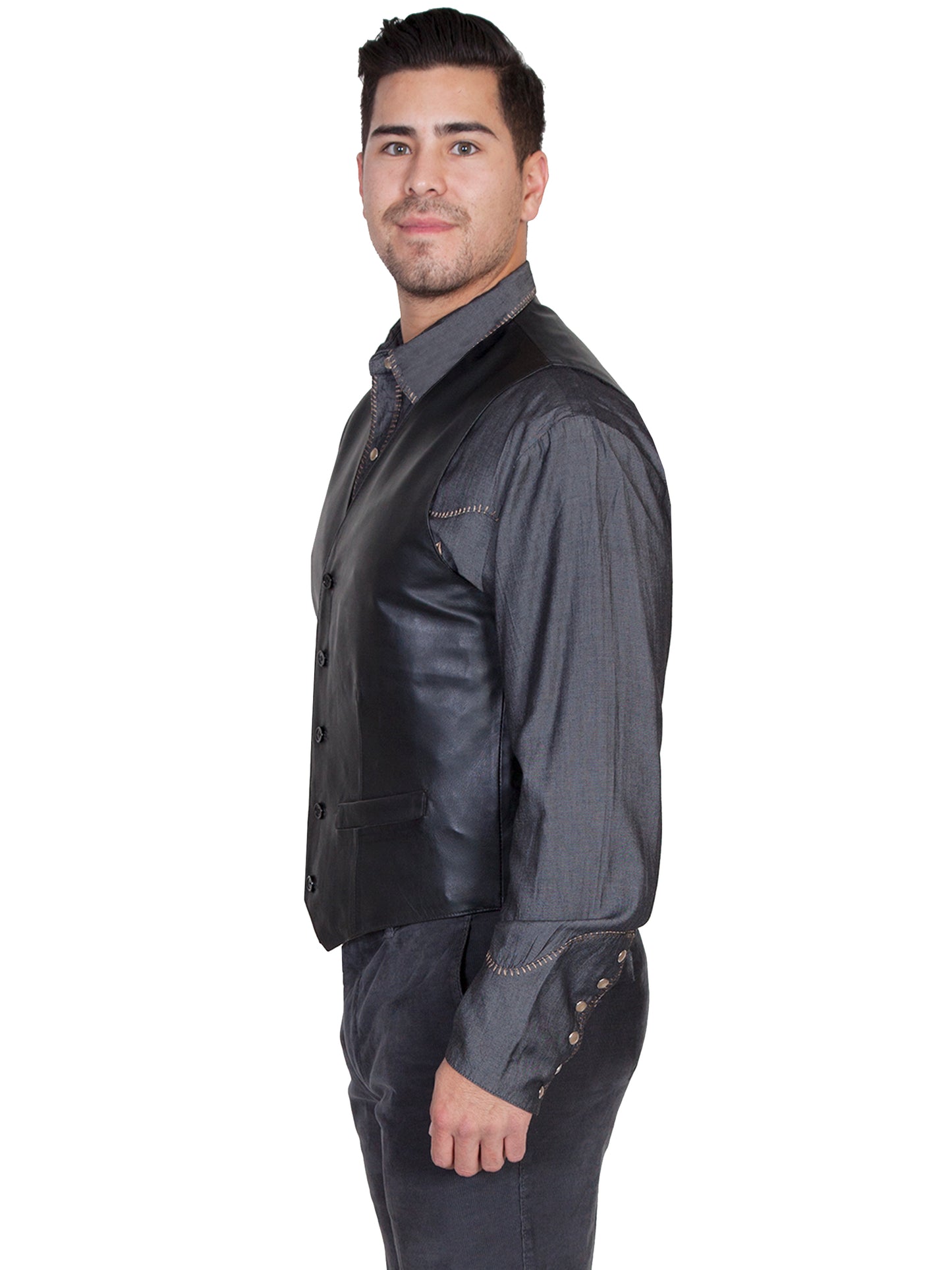 Man standing in in black vest