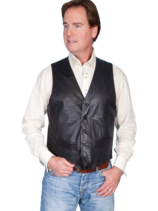 Man standing in in black vest