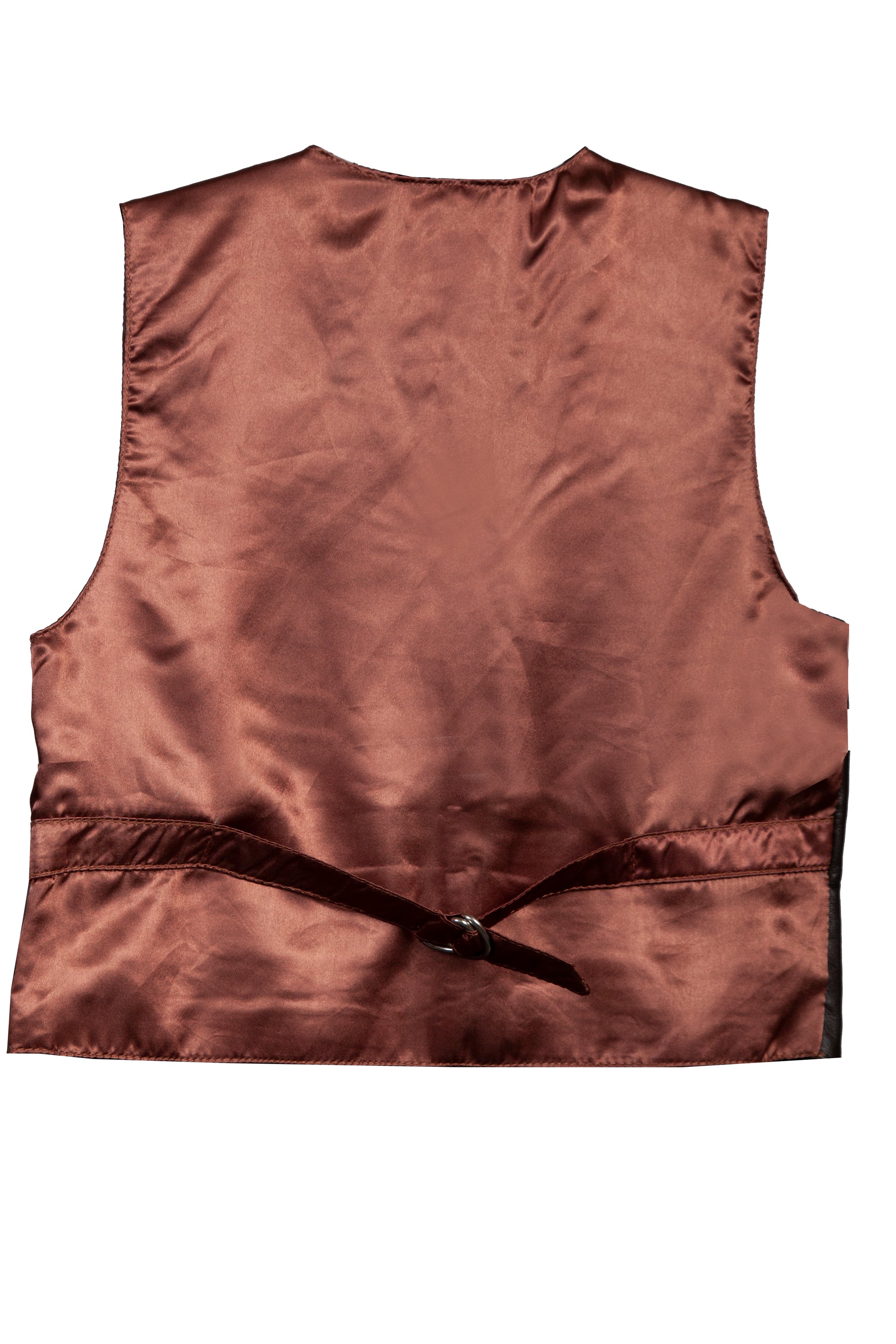 Boy standing in in brown vest