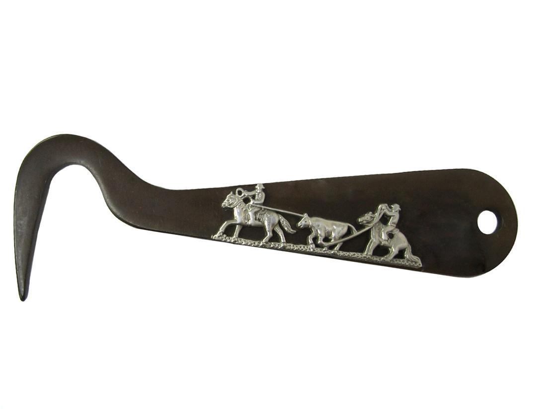 Decorative hoof pick with engraved design on a white background