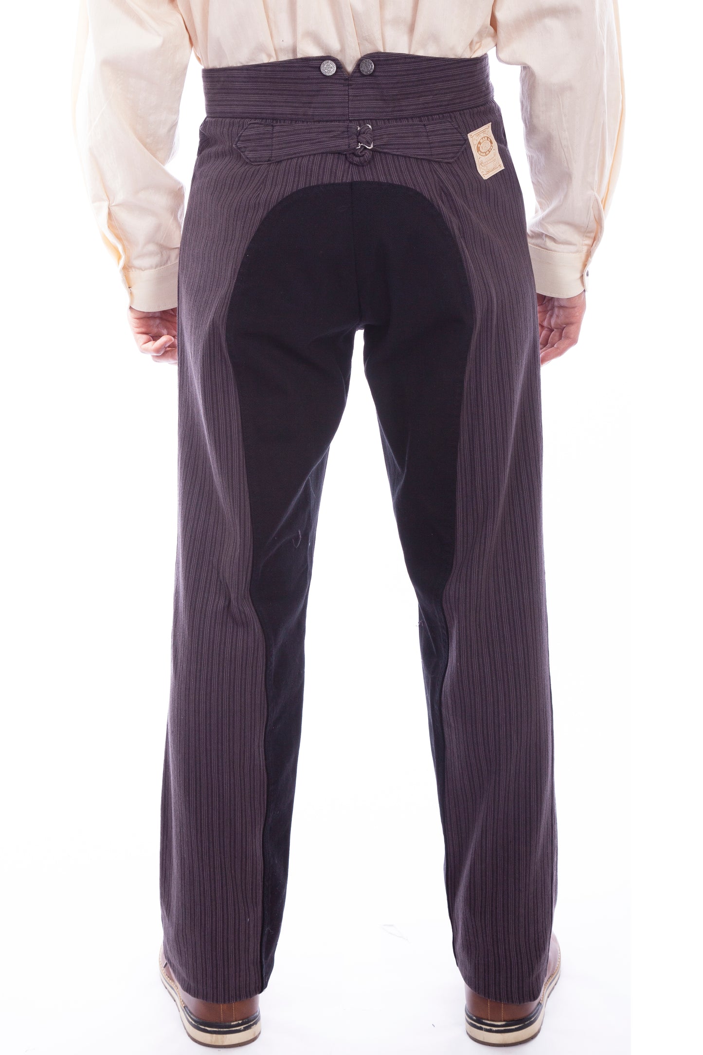 Long sleeve button front mens shirt with contrast stitching made in soft peruvian cotton. Features a full button front point collar with hidden button down and a soft western back yoke. 100% cotton. Machine washable. Import.