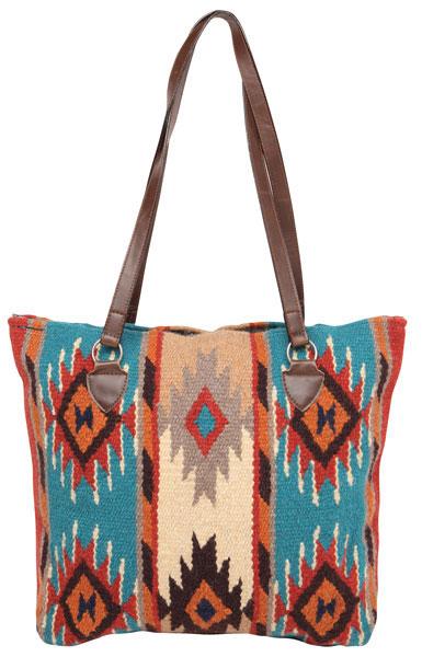 Tote bag with tribal pattern and brown leather straps on a white background