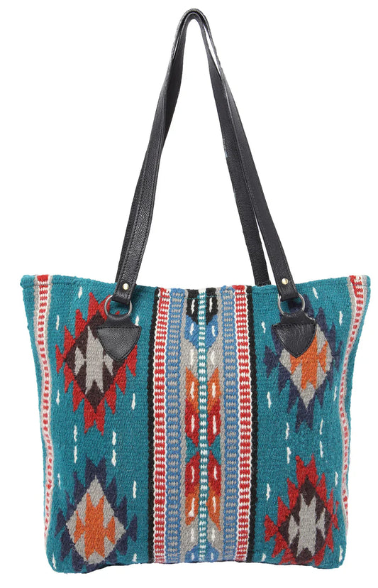 Colorful patterned handbag with black straps on a white background